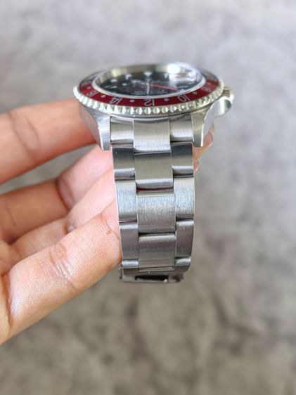 Rolex pepsi GMT 16710 T
No holes
Brand new condition. Used
Real 100 percent 
    Verified original serial numbers and model.  รูปที่ 4