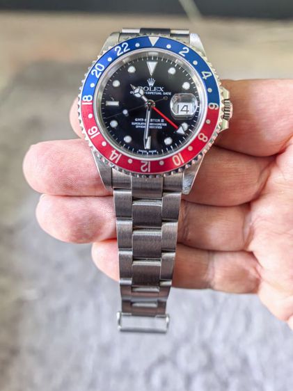 Rolex pepsi GMT 16710 T
No holes
Brand new condition. Used
Real 100 percent 
    Verified original serial numbers and model.  รูปที่ 3