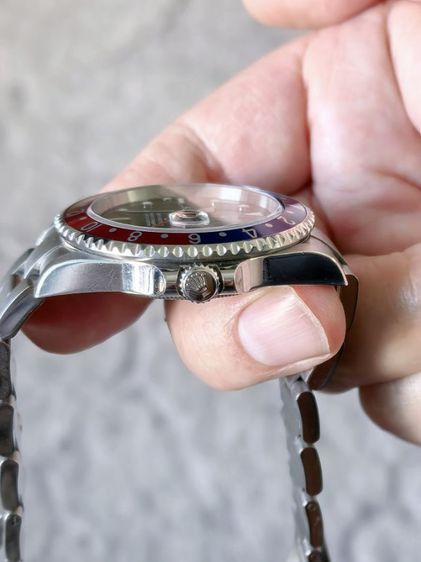 Rolex pepsi GMT 16710 T
No holes
Brand new condition. Used
Real 100 percent 
    Verified original serial numbers and model.  รูปที่ 7