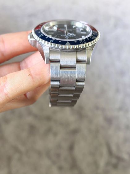 Rolex pepsi GMT 16710 T
No holes
Brand new condition. Used
Real 100 percent 
    Verified original serial numbers and model.  รูปที่ 5