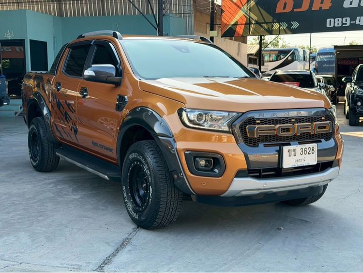 รถ Ford Ranger 2.0 Bi-Turbo 4WD Wildtrak สี ส้ม