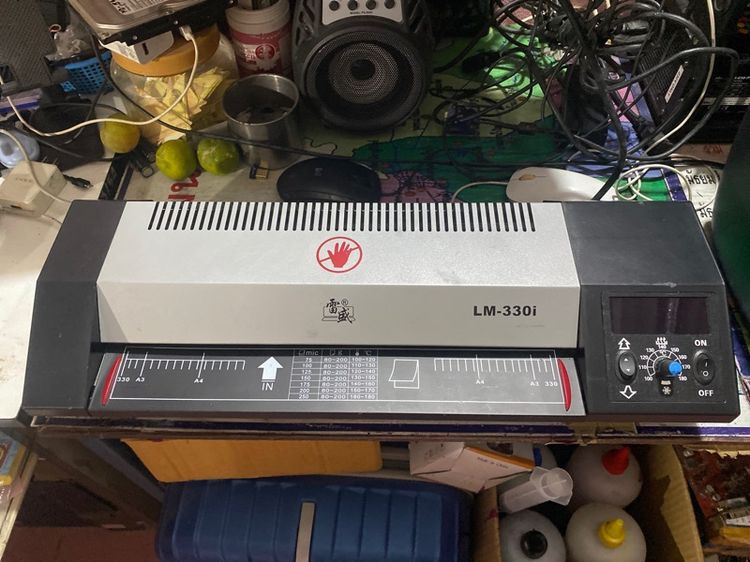 เครื่องเคลือบบัตร LM-330i ชำระปลายทางได้