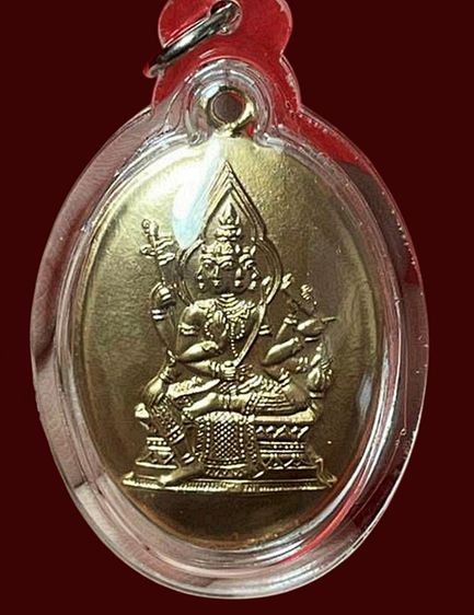 พระพรหมเก่าด้านหลังมีรอยยันต์เลี่ยมกรอบเก่า