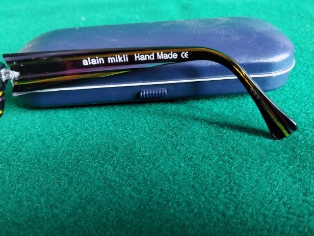 ขอขายกรอบแว่นตาแบรนด์ Alain mikli รุ่น AL 0822  แท้ ขนาด 58-15-135มม.www.mikli.com.เป็นกรอบแว่นระดับพรีเมี่ยมสภาพยังใหม่มากไม่ตำหนิ รูปที่ 11