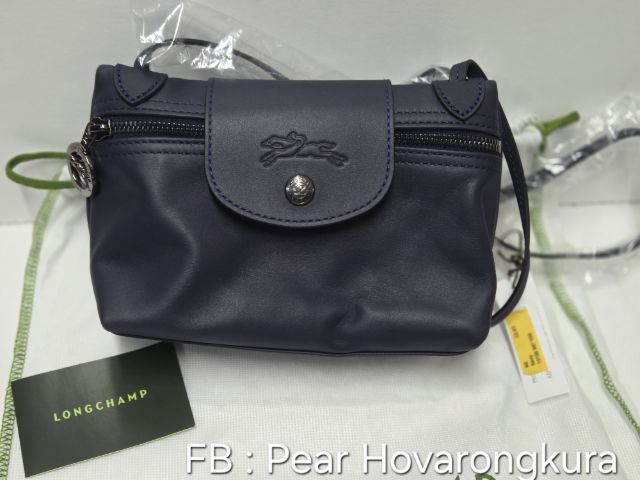Le Pliage Xtra Mini Crossbody Bag
สี Navy  หนังนุ่มเรียบเนียน
แท้ มือ1ซื้อมาเก็บ  ถุงผ้าและป้ายครบ
📍 8,500 บาท (รวมส่ง) รูปที่ 4