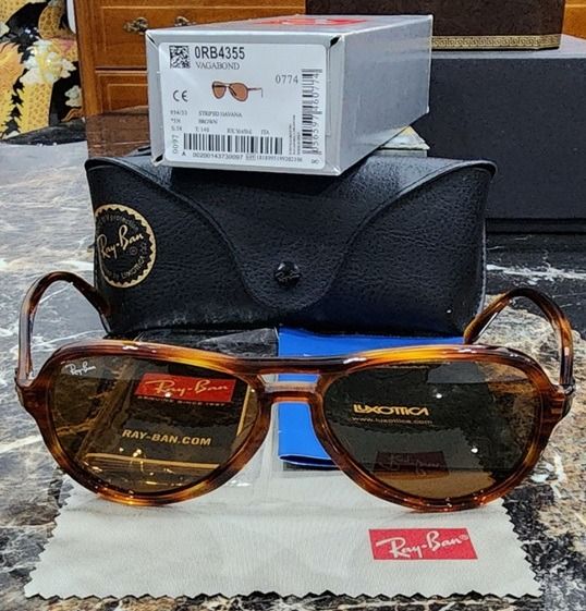 ส่งต่อ Ray-Ban RB3721D เลนส์เหลือง Ray-Ban Vagabond RB4355 ลายกระ สภาพดีสวยกริป พิกัดระยองครับ