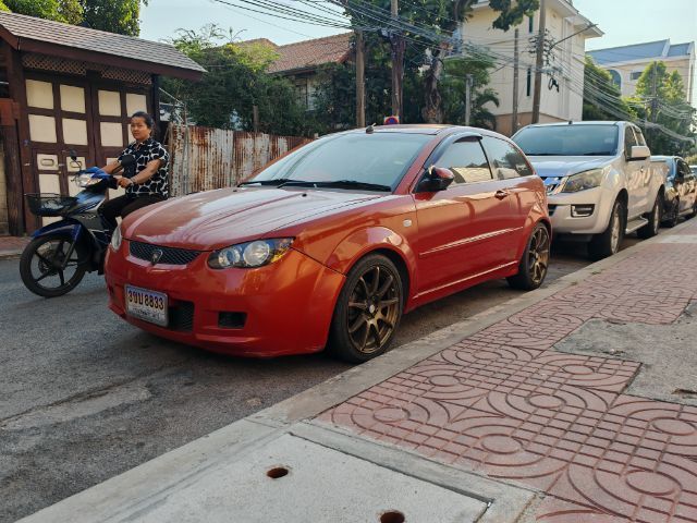 Proton Satria 2008 รุ่นย่อยอื่นๆ Sedan เบนซิน ไม่ติดแก๊ส เกียร์อัตโนมัติ ส้ม รูปที่ 2