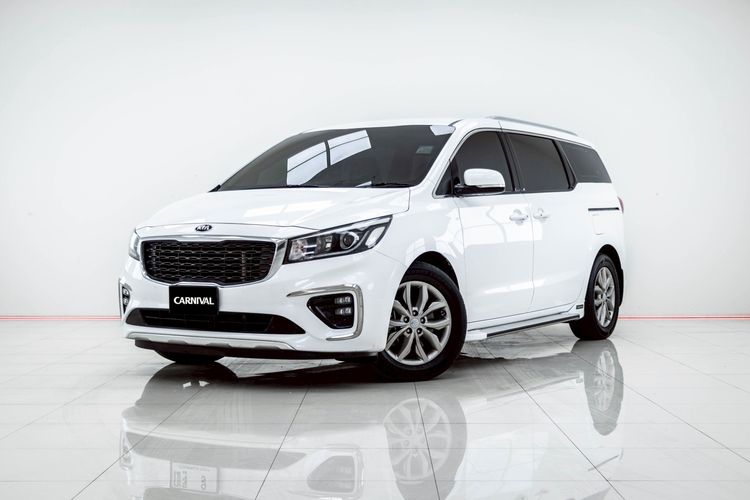 รถ Kia Grand Carnival 2.2 EX สี ขาว
