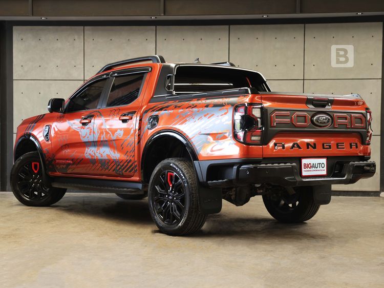 Ford Ranger 2024 2.0 Bi-Turbo Hi-Rider Storntrak Pickup ดีเซล ไม่ติดแก๊ส เกียร์อัตโนมัติ ส้ม รูปที่ 4