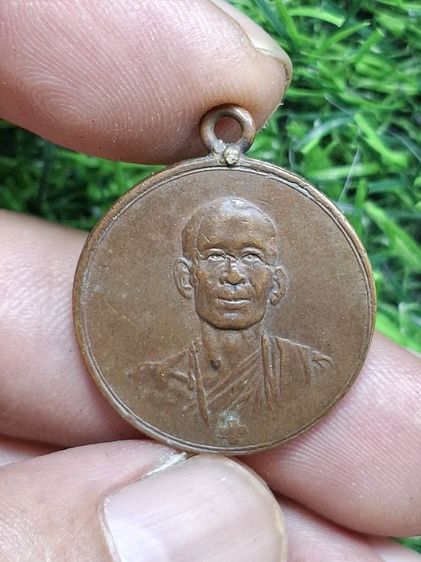 เหรียญห่วงเชื่อม เนื้อเหรียญเก่าครับ(สีมะขามเปียก)