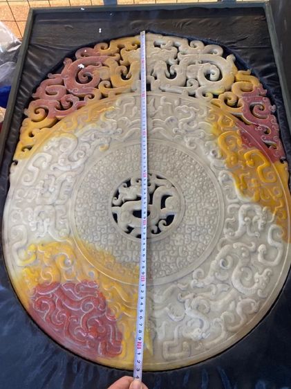 แผ่นหยกทรงกลมที่มีรูตรงกลาง เรียกว่า อวี้ปี้ รูปที่ 3