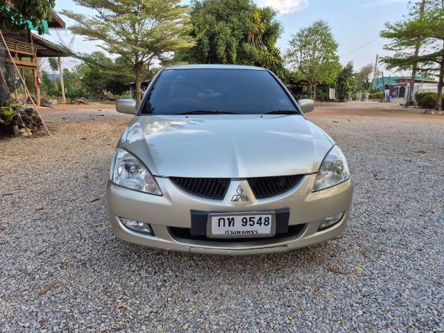 รถ Mitsubishi Lancer 1.6 GLX สี บรอนซ์ทอง