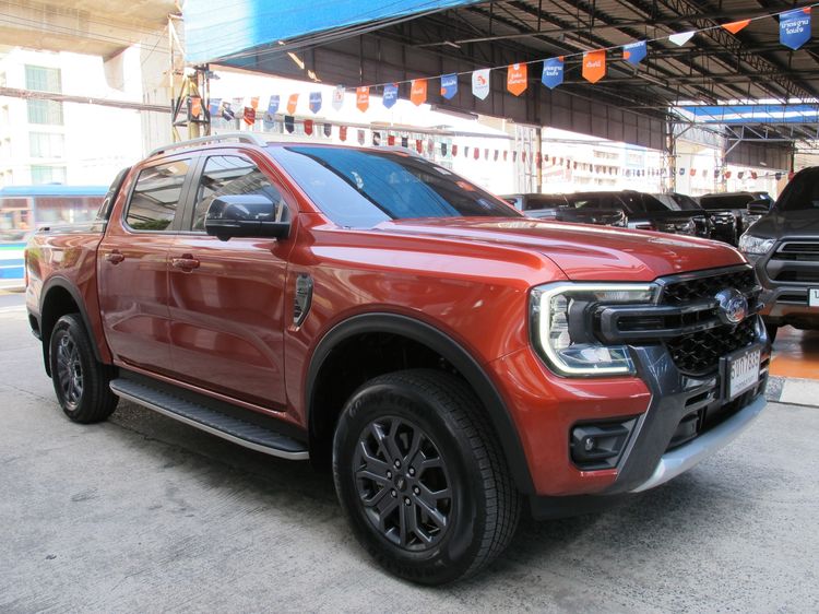 Ford Ranger 2024 2.0 Bi-Turbo Hi-Rider Wildtrak Pickup ดีเซล ไม่ติดแก๊ส เกียร์อัตโนมัติ ส้ม รูปที่ 2