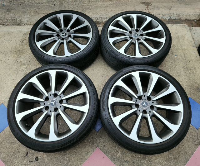 ล้อแท้ Benz ผลิตเยอรมัน ขอบ19 สีทูโทนเงาตาแตก 5รู112 กว้าง7.5-8.5 ET44-56 สภาพสวยๆ ติดแถมยางContinental ปี22 ดอกยางยังดี ใส่ตรงรุ่น Benz 