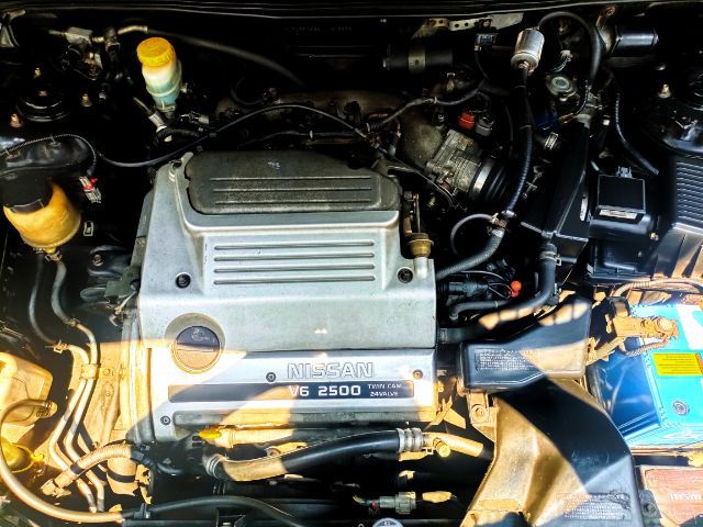 Nissan Cefiro 2004 2.0 Sedan เบนซิน LPG เกียร์อัตโนมัติ ดำ รูปที่ 2