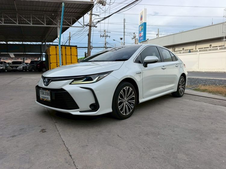 Toyota Altis 2021 1.8 Hybrid Mid Sedan ไฮบริด ไม่ติดแก๊ส เกียร์อัตโนมัติ ขาว รูปที่ 2
