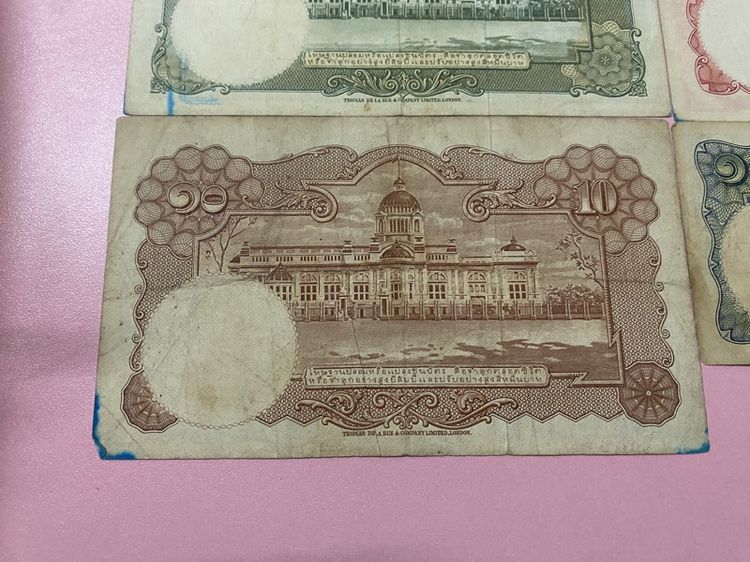 ธนบัตรเก่าในภาพเป็น ธนบัตรไทยแบบที่ 9 ยกชุด (แบบโทมัส) รูปที่ 2