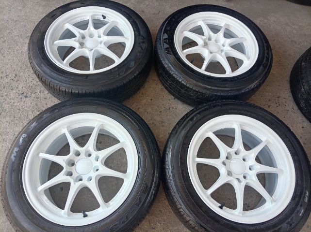 15" C e 28 สีขาวกว้าง 7 พร้อมยางปี 23
