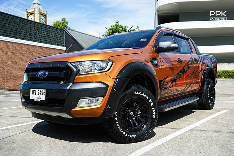 รถ Ford Ranger 2.2 Hi-Rider Wildtrak สี ส้ม