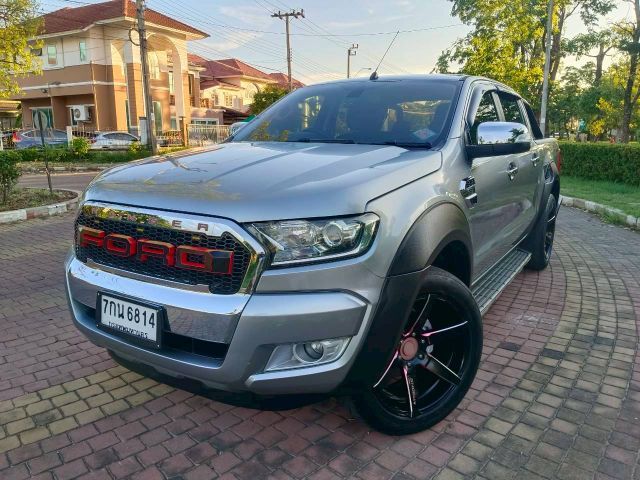 รถ Ford Ranger 2.2 Hi-Rider XLT สี บรอนซ์เงิน
