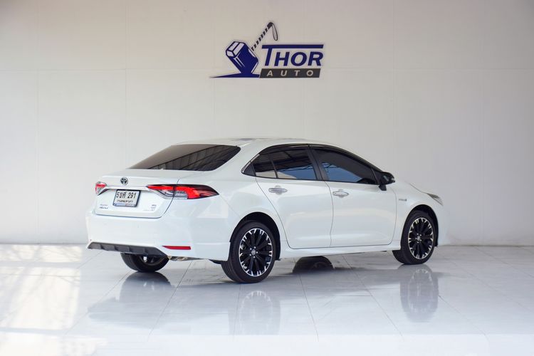 Toyota Altis 2023 1.8 Hybrid GR Sport Sedan ไฮบริด เกียร์อัตโนมัติ ขาว รูปที่ 4