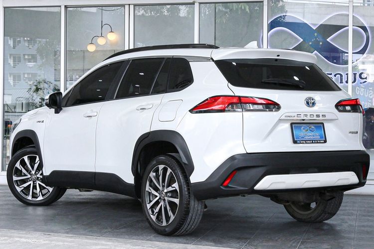 Toyota Corolla Cross 2021 1.8 Hybrid Premium Safety Utility-car ไฮบริด เกียร์อัตโนมัติ ขาว รูปที่ 4