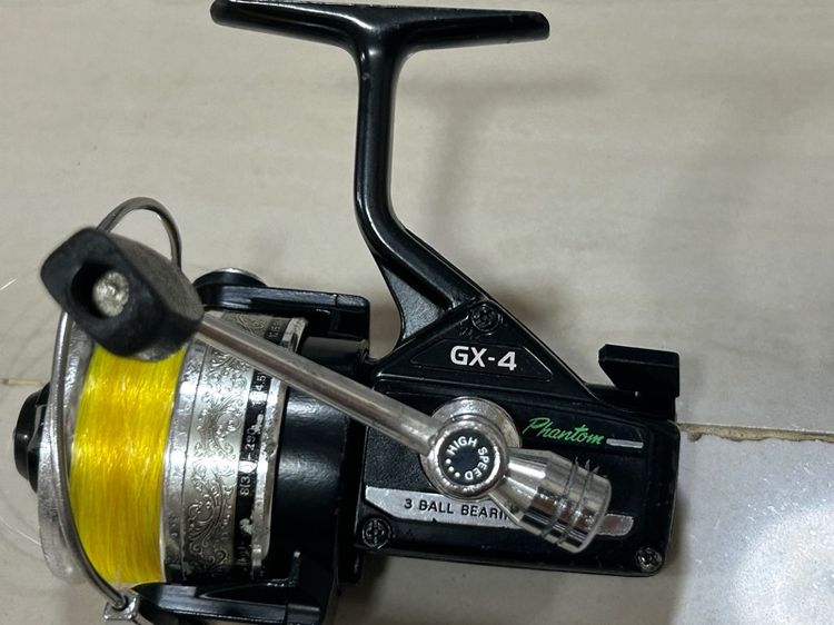 คันเบ็ดและรอก daiwa dx-4 และ sportline ST-600x และคัน รูปที่ 6