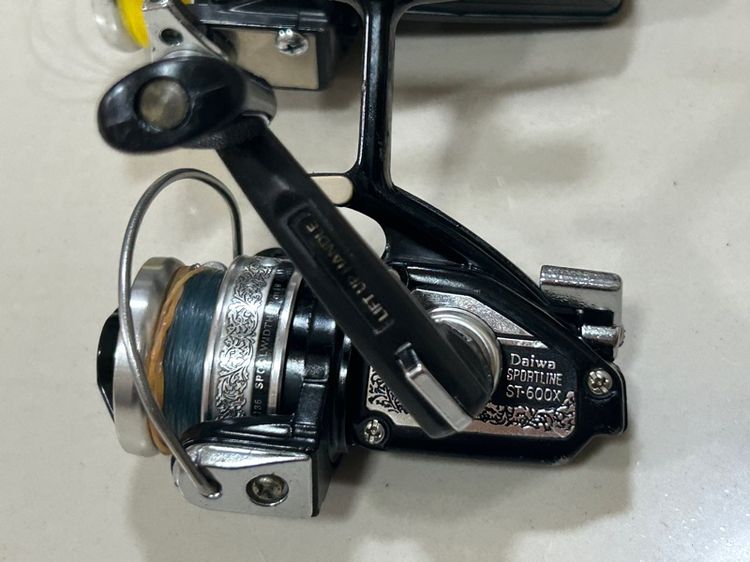 คันเบ็ดและรอก daiwa dx-4 และ sportline ST-600x และคัน รูปที่ 4