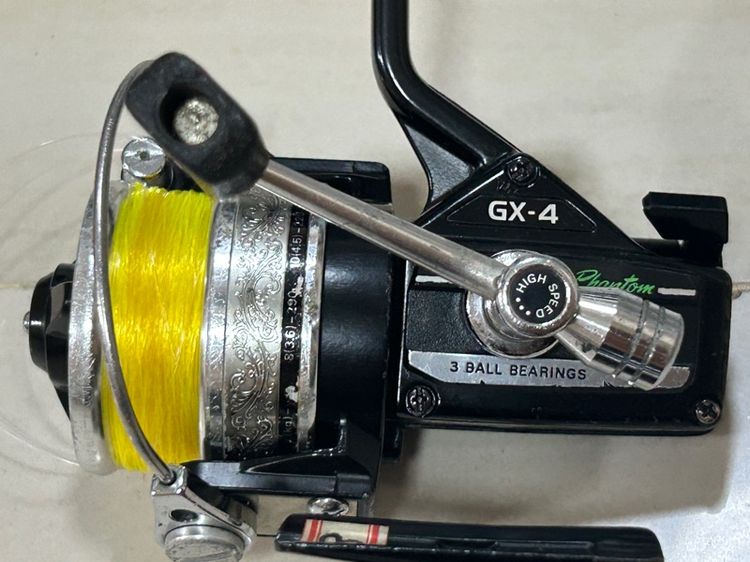 คันเบ็ดและรอก daiwa dx-4 และ sportline ST-600x และคัน รูปที่ 8