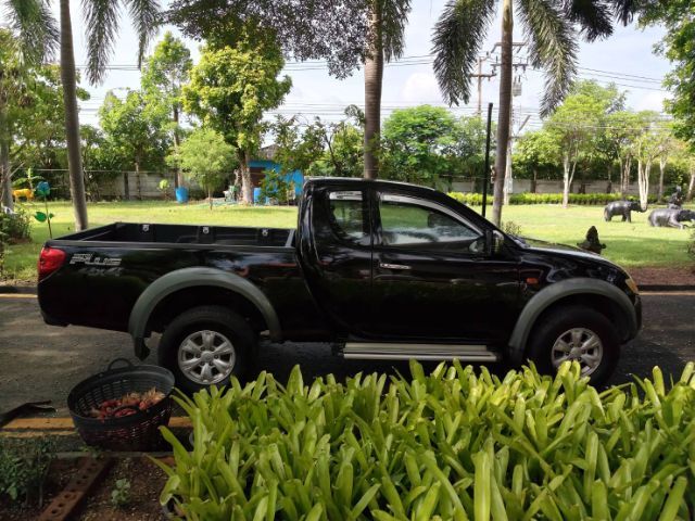 รถ Mitsubishi Triton 2.5 Megacab Plus VN Turbo สี ดำ