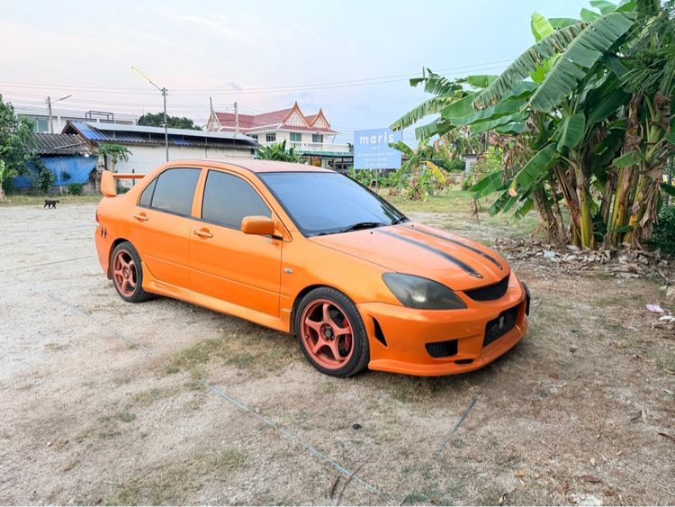 รถ Mitsubishi Lancer 1.6 GLXi สี ส้ม