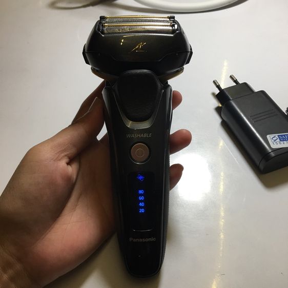 เครื่องโกนหนวดไฟฟ้า ไร้สาย ยี่ห้อ Panasonic รุ่น 5 ใบมีด สภาพใหม่ ใช้งานได้ปกติ พร้อม อแดปเตอร์ชาร์จ   รูปที่ 12
