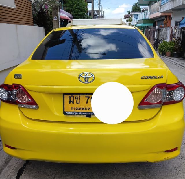 รถ Toyota Altis 1.6 J สี เหลือง