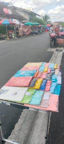 เสื้อยืดลายปัก