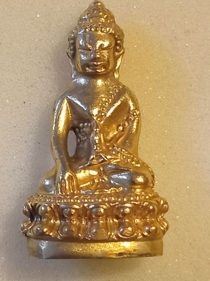 พระกริ่งปวเรศเปียกทอง