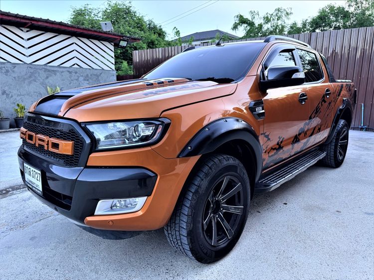รถ Ford Ranger 3.2 Wildtrak 4WD สี ส้ม