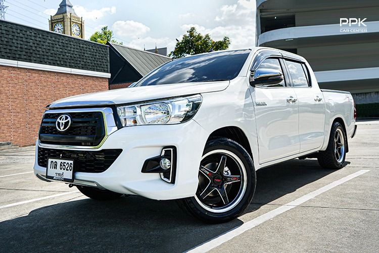 รถ Toyota Hilux Revo 2.4 J Plus สี ขาว