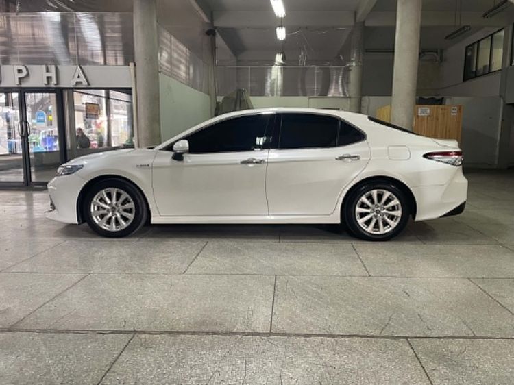 Toyota Camry 2019 2.5 Hybrid Navi Sedan ไฮบริด ไม่ติดแก๊ส เกียร์อัตโนมัติ ขาว