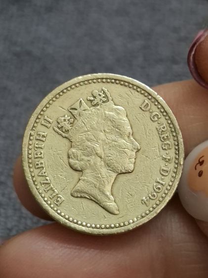 เหรียญ 1 ปอนด์ (One Pound Coin) จากสหราชอาณาจักร ผลิตขึ้นในปี 1994 รูปที่ 2