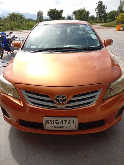 รถ Toyota Corolla 1.6 สี ส้ม