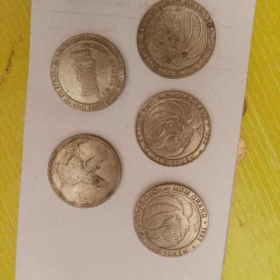 เหรียญโทเค็นสำหรับเล่นเกม (Gaming Token) มูลค่า 1 ดอลลาร์ จากคาสิโน MGM Grand ในลาสเวกัส ผลิตขึ้นในปี 1993 รูปที่ 2