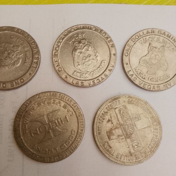 เหรียญโทเค็นสำหรับเล่นเกม (Gaming Token) มูลค่า 1 ดอลลาร์ จากคาสิโน MGM Grand ในลาสเวกัส ผลิตขึ้นในปี 1993 รูปที่ 7