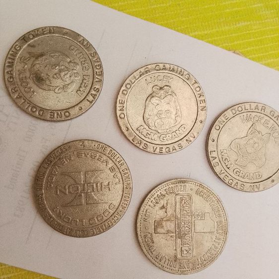 เหรียญโทเค็นสำหรับเล่นเกม (Gaming Token) มูลค่า 1 ดอลลาร์ จากคาสิโน MGM Grand ในลาสเวกัส ผลิตขึ้นในปี 1993 รูปที่ 8