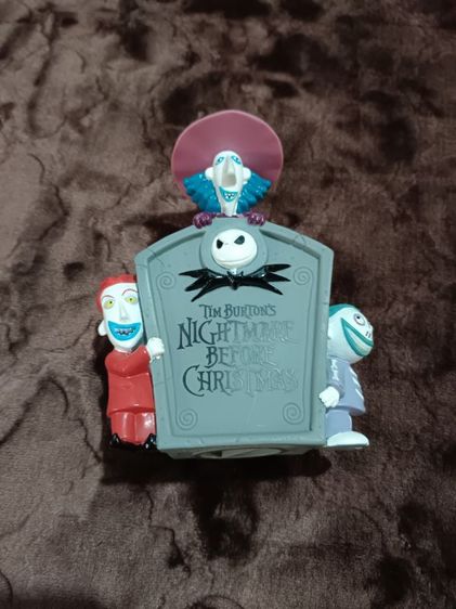 The Nightmare Before Christmas" Lock, Shock, and Barrel coin bank produced by SEGA in 1998