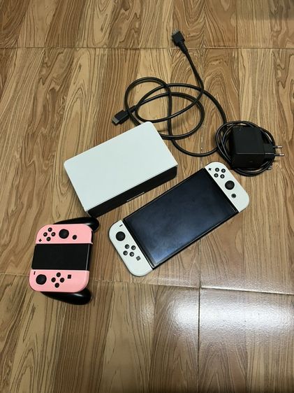 เครื่องเกมส์นินเทนโด เชื่อมต่อไร้สายไม่ได้ Nintendo Switch สีขาว เป็นรุ่น OLED Model