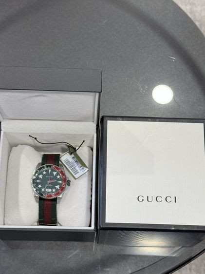 หลากสี ส่งต่อนาฬิกาGucci Dive King Size (รหัส 136.3) ของแท้ 100% ครับแบรนด์/รุ่น: Gucci Dive Quartz (Case Size 40-41 mm)