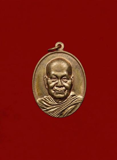 เหรียญลพ.จรัญ อายุ 84 ปี 2554