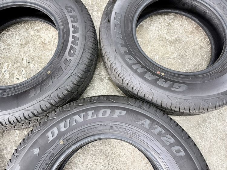 ยางถอดป้ายแดงขอบ 15” ยี่ห้อ DUNLOP ขนาด 195-80R15 ปี 26 MADE IN JAPAN ตุ่มหน้ายางยังอยู่ครบ