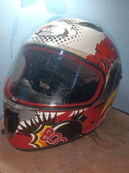 แบรนด์/รุ่น: Real Helmets รุ่น Raptor ลาย Comicsไซส์: L (รอบหัวประมาณ 59-60 ซม.)สภาพภายนอก: มีรอยขีดข่วนตามการใช้งานทั่วไป ชิลด์หน้ายังใช้งานได้ปกติ ไม่มีรอยแตกร้า