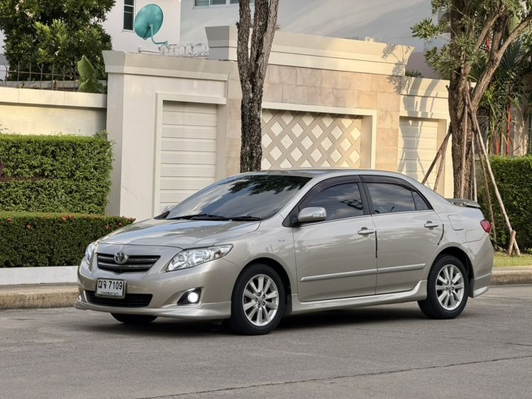รถ Toyota Altis 1.8 E สี บรอนซ์ทอง